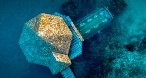 Conrad Maldives Rangali Island Ithaa Undersea Restaurant drone shot