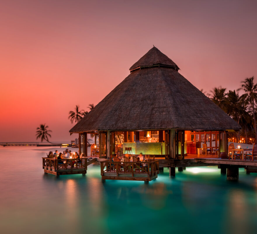 Conrad Maldives Rangali Island Sunset Grill overwater dining at dusk