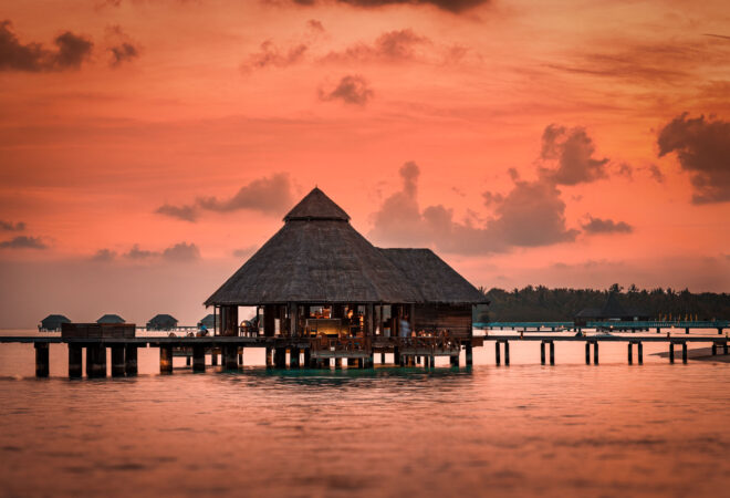 Conrad Maldives Rangali Island Sunset Grill overwater dining at dusk